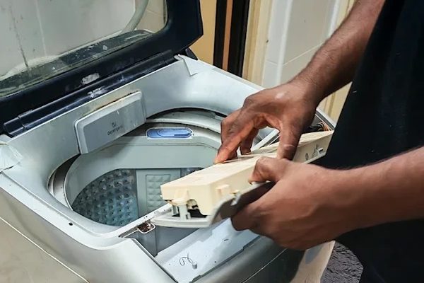 Replacing a part inside a top-load washing machine