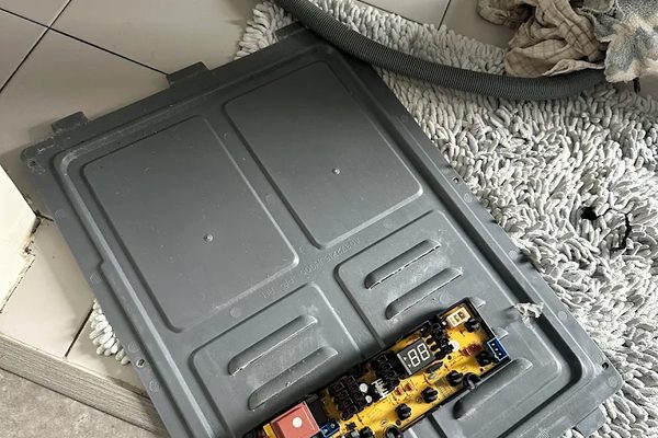 Control board removed from a washing machine for testing